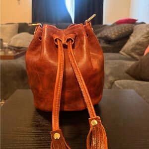 KMM & co. Whiskey bison mini bucket bag. EUC